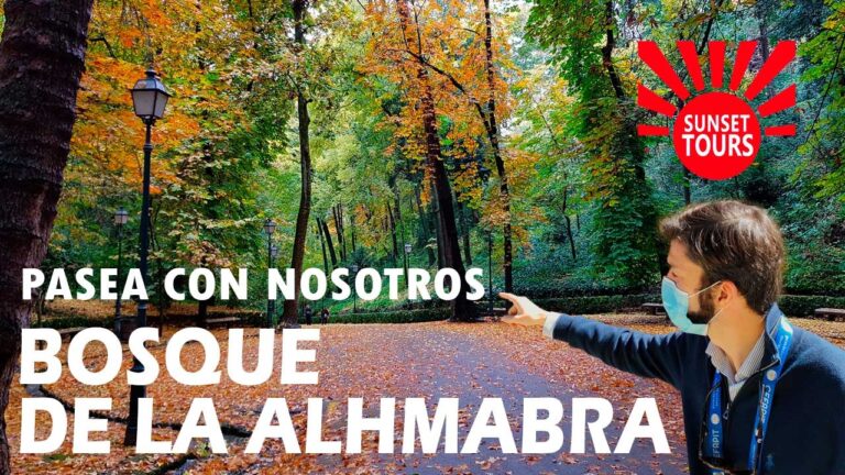 El bosque de la Alhambra en otoño con un guía de turismo explicando